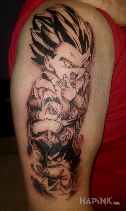 Tattoo Goten Trunks Gotenks in black and gray motif and cartoon / comic book style on the upper arm