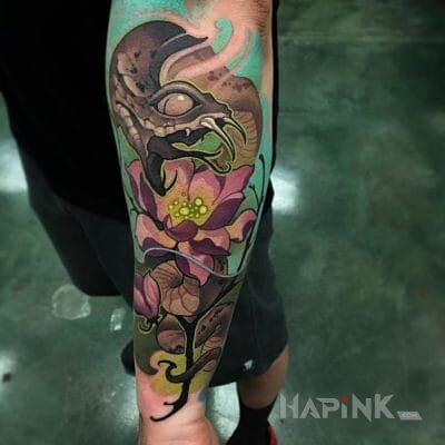 Tattoo Waz in animals motif on the forearm