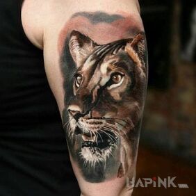 Tattoo Lioness on the upper arm motif: 3D style: realistic