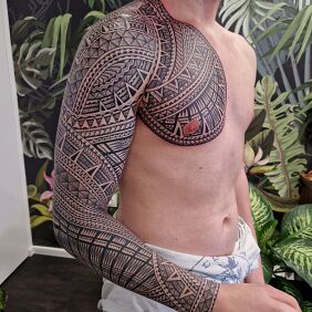 Tattoo Polynesian Sleeve, Samoa on the chest motif: black and gray style: Polynesian