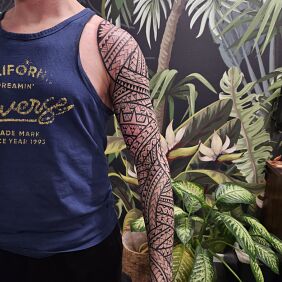 Tattoo Polynesian Sleeve in Samoan style on the upper arm motif: sleeves style: Polynesian