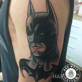 Tattoo Baaatmaaan! on the forearm motif: faces