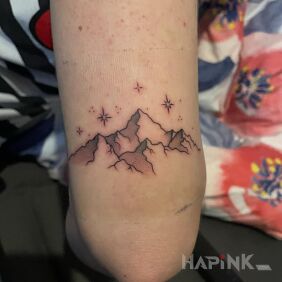 Tattoo Mountains On the arm motif: black and gray style: graphic / illustrative