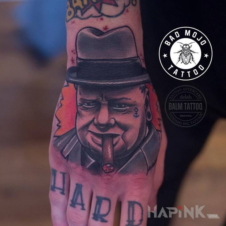 Tattoo Winston Churchill in characters motif on the hand