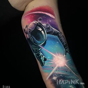 Tattoo Astronaut sleeve on the bicep motif: characters style: realistic