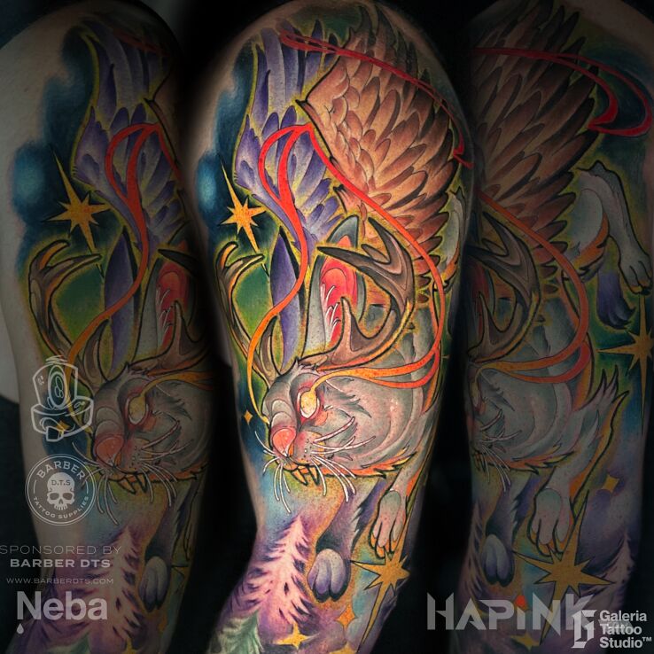 Tattoo Newschool Wolpertinger in wings motif and surrealistic style on the upper arm