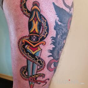 Tattoo Dagger with a snake on the thigh motif: animals style: graphic / illustrative