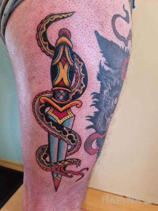 Tattoo Sztylet z wężem in animals motif and oldschool style on the leg