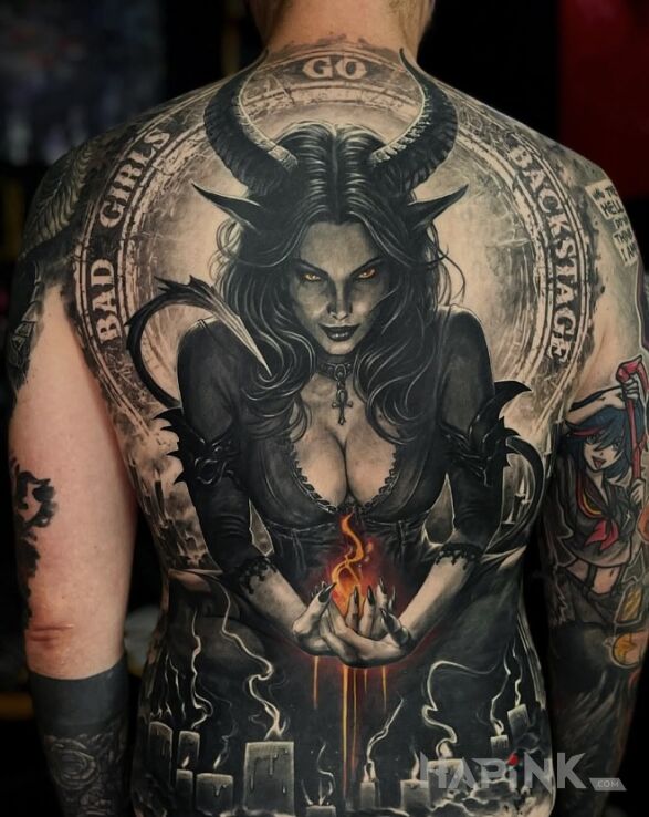 Tattoo Diablica! in black and gray motif and realistic style on the back