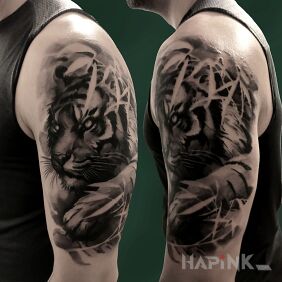 Tattoo Tiger on the upper arm motif: animals style: realistic