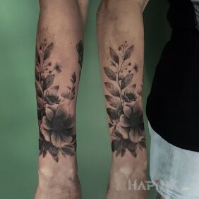 Tattoo Flowers on the forearm motif: nature style: realistic