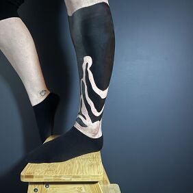 Tattoo Blackwork around the calf on the calf motif: black and gray style: blackwork / blackout