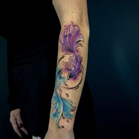 Tattoo Fish in two colors On the arm motif: animals style: Watercolor