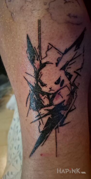 Tattoo Pokemon in characters motif and graphic / illustrative style on the calf