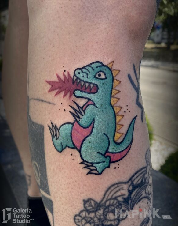Tattoo Oldschool Godzilla in fantasy motif and newschool style on the leg