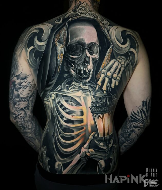 Tattoo Grim Reaper Back Tattoo in characters motif and realistic style on the shoulder blades