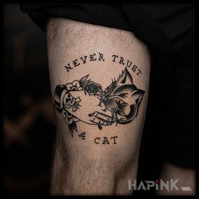 Tattoo Never trust a cat on the leg motif: animals style: oldschool