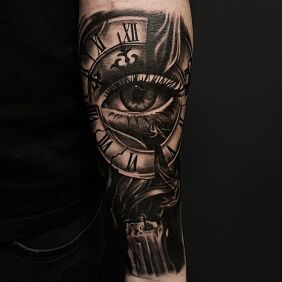 Tattoo Eye incorporated into a clock on the forearm motif: other style: realistic