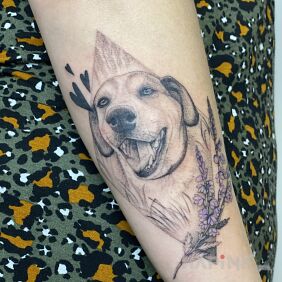 Tattoo Happy Puppy On the arm motif: animals style: realistic