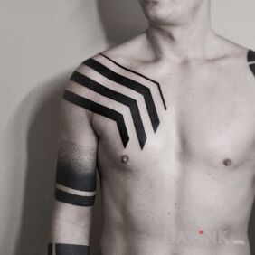 Tattoo Black male composition on the upper arm style: dotwork