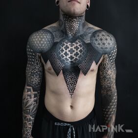 Tattoo Client in fantastic geometric patterns on the shoulder motif: ornaments style: dotwork