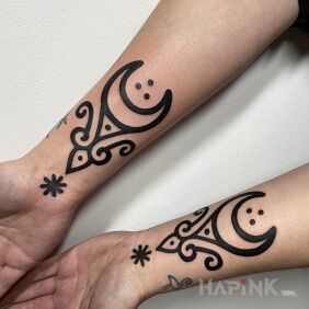 Tattoo Symbols with black outline On the arm motif: ornaments style: blackwork / blackout