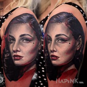 Tattoo Elena's work on the upper arm motif: faces style: realistic