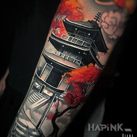 Tattoo Japanese pagoda on the forearm motif: floral style: japanese / irezumi