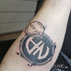 Tattoo Narcoticus anonimus On the arm motif: black and gray style: graphic / illustrative