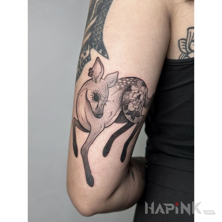 Tattoo Piękna sarenka w dotworku in black and gray motif and graphic / illustrative style On the arm