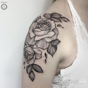 Tattoo Alexandra's work with Bad Mojo Tattoo Gdansk. on the upper arm motif: flowers