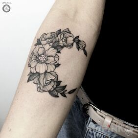 Tattoo Alexandra's work with Bad Mojo Tattoo Gdansk. on the forearm motif: flowers