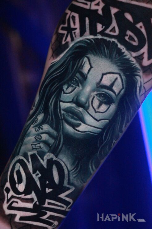 Tattoo Dziewczyna chicano in lettering motif and realistic style on the forearm