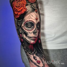 Tattoo Santa muerte with a necklace on the forearm motif: colorful style: surrealistic