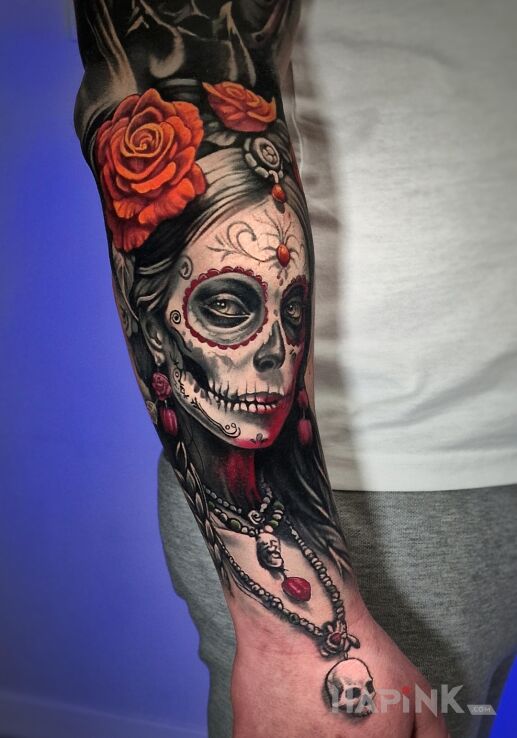 Tattoo Santa muerte z naszyjnikiem in colorful motif and realistic style On the arm