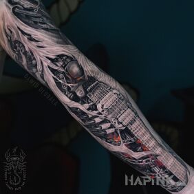 Tattoo Biomechanical electric guitar on the forearm motif: dark style: realistic
