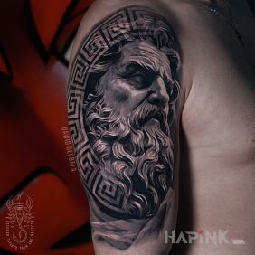 Tattoo Greek statue on the upper arm motif: black and gray style: realistic