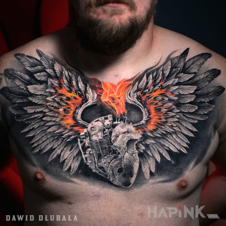 Tattoo Moto Serce ze skrzydłami in motorization motif and realistic style on the collarbone