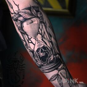Tattoo Time flies on the forearm motif: dark style: realistic