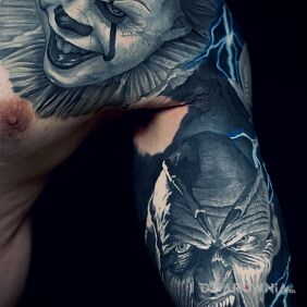 Tatuaż Pennywise i Smakosz na ręce motyw: postacie styl: realistyczne