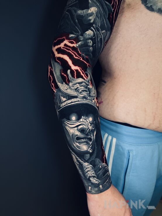 Tattoo Samuraj in characters motif and realistic style on the forearm