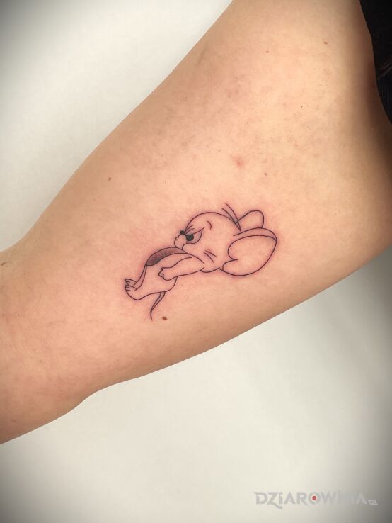 Tattoo Jeryy in black and gray motif and contour / linework style On the arm