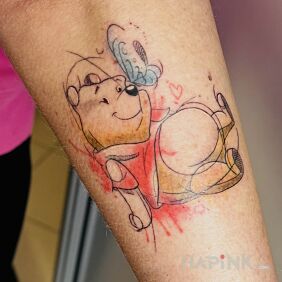 Tattoo Winnie the Pooh on the forearm motif: characters style: Watercolor
