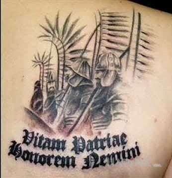 Tattoo Maksyma husarii in lettering motif on the chest