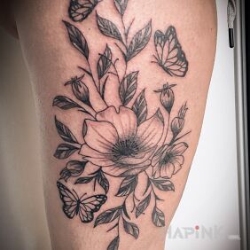 Tattoo Butterflies around flowers on the leg motif: butterflies style: graphic / illustrative