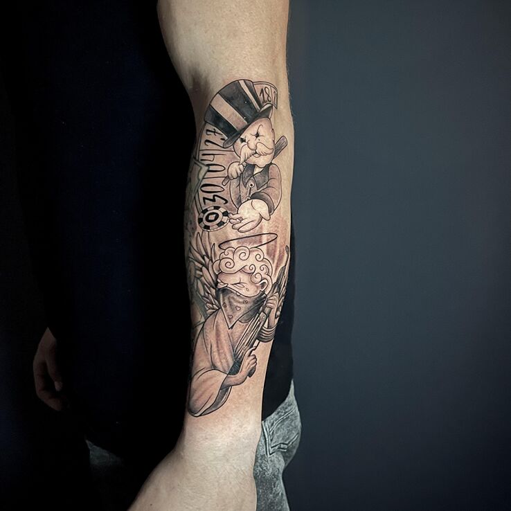 Tattoo Anioł z karabinem i Monopoly Man in characters motif and graphic / illustrative style On the arm