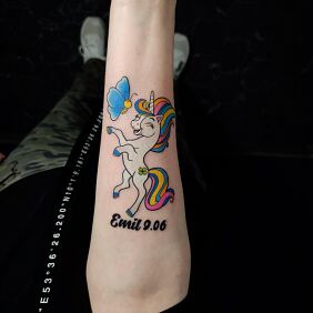 Tattoo Colorful unicorn name date forearm On the arm motif: lettering style: graphic / illustrative