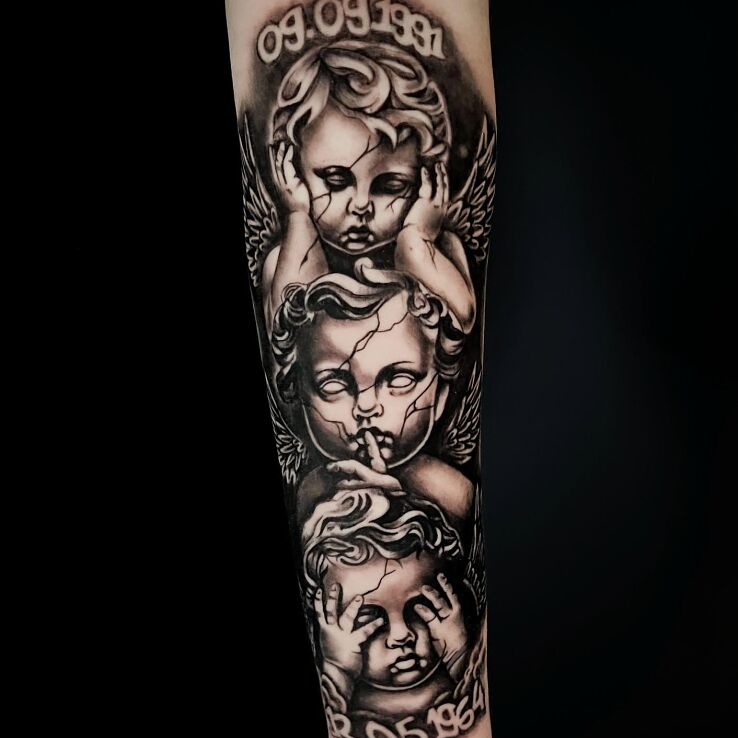 Tattoo Dzieci nie widzę nie słyszę nie mówię przedramię data in black and gray motif and graphic / illustrative style on the forearm