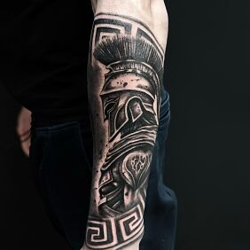 Tattoo Roman legionary On the arm motif: war style: realistic