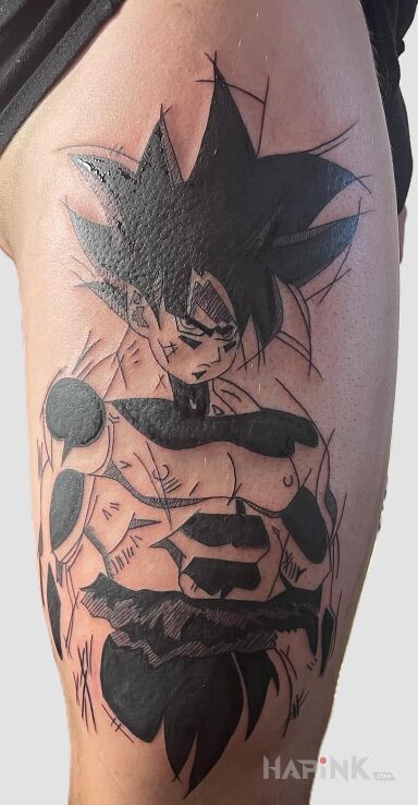 Tattoo Goku in manga / anime motif and graphic / illustrative style on the thigh